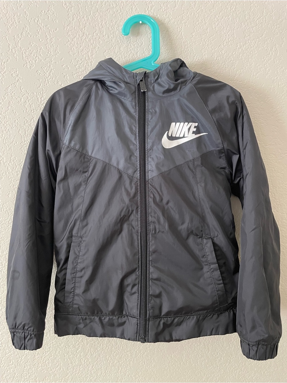 Nike Kids Black Raincoat with White Logo